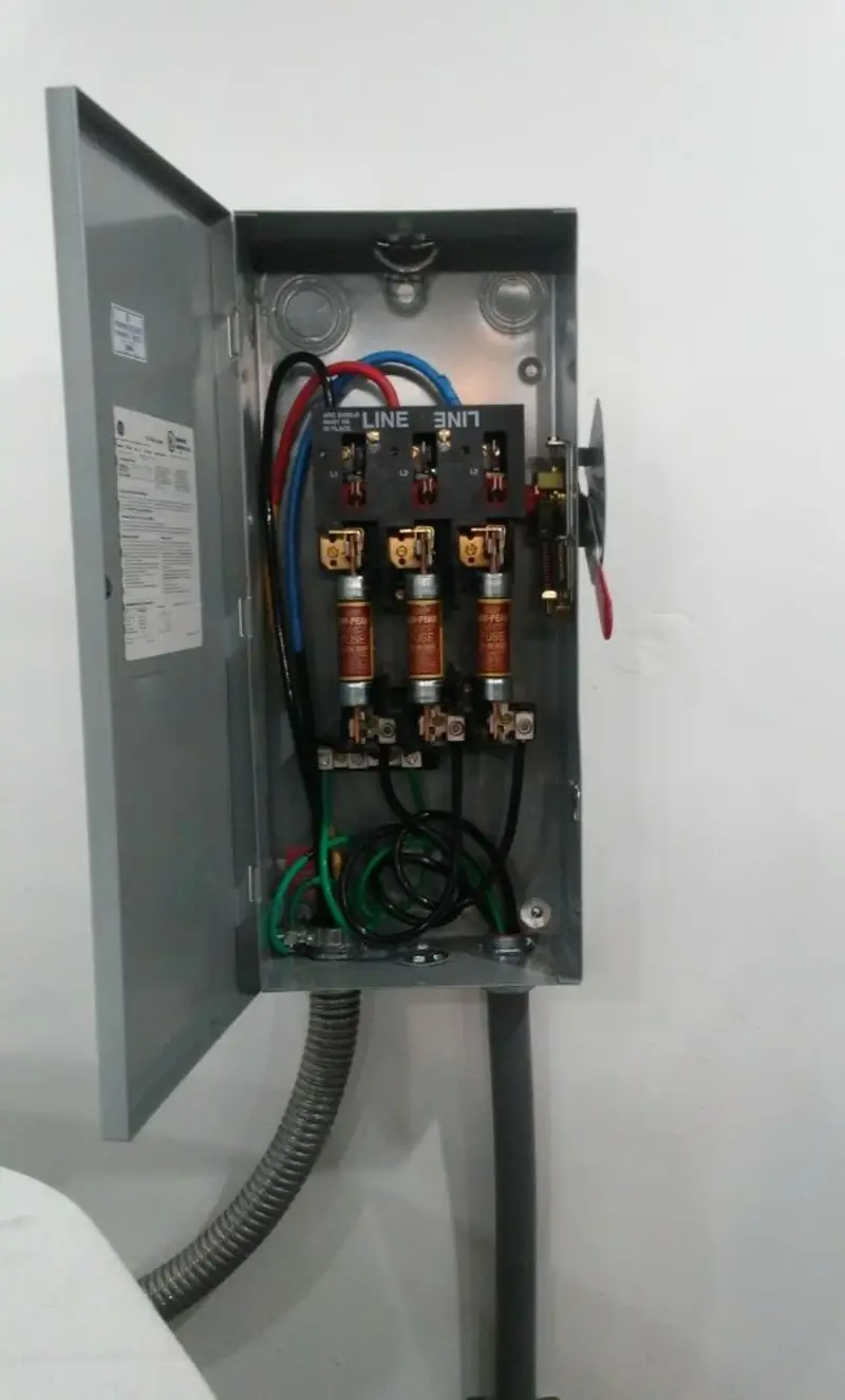 Three-phase disconnect switch installed for Smoke Detector Installation in Kenneth City